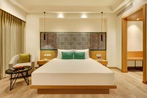 Letto o letti in una camera di Lemon Tree Premier, Bhubaneswar