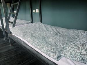 生活就是Lifeis新城民宿客房内的一张或多张床位
