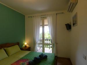 Postel nebo postele na pokoji v ubytování B&B MrCaruba
