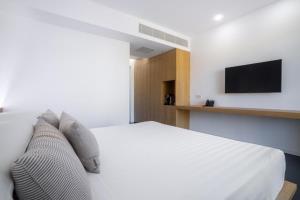 TV a/nebo společenská místnost v ubytování Felix Hotels - Hotel Felix Olbia