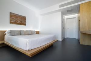 Postel nebo postele na pokoji v ubytování Felix Hotels - Hotel Felix Olbia