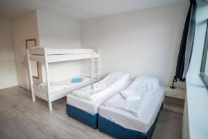 Postel nebo postele na pokoji v ubytování Guesthouse Pavi