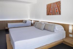 Postel nebo postele na pokoji v ubytování Felix Hotels - Hotel Felix Olbia