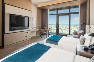 Uma TV ou centro de entretenimento em Paramount Hotel Midtown