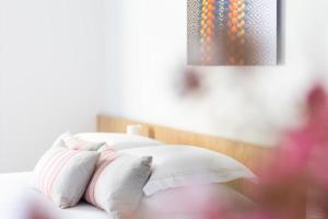 Postel nebo postele na pokoji v ubytování Felix Hotels - Hotel Felix Olbia