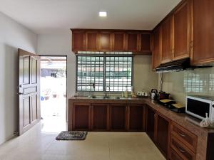 Köök või kööginurk majutusasutuses NanSang One Homestay 8pax 4Rooms