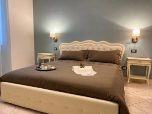 Letto o letti in una camera di SOAVE GUEST HOUSE