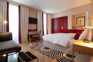 Postel nebo postele na pokoji v ubytování Hôtel Longemalle + 37 fotografií