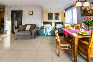 Posezení v ubytování Apartamenty Izerskie
