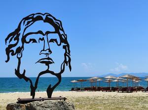 a statue of a man on the beach at Stamatia Suites in Asprovalta +59 photos