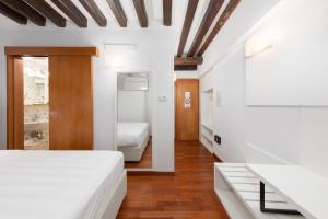Postel nebo postele na pokoji v ubytování Spadaria San Marco Guest House