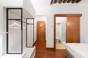 Postel nebo postele na pokoji v ubytování Spadaria San Marco Guest House