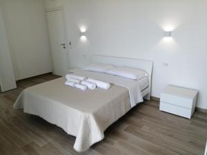 Letto o letti in una camera di AMARE Bed & Breakfast