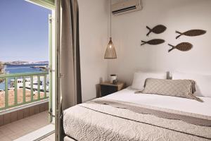 A bed or beds in a room at Noon Beyond Accommodation
