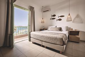 A bed or beds in a room at Noon Beyond Accommodation