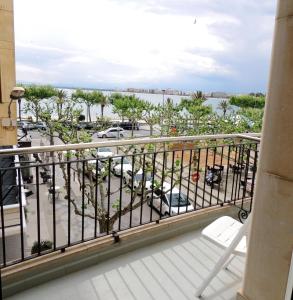 a balcony with a view of a parking lot at Tramuntana 2 1 Roses- Immo Barneda in Roses