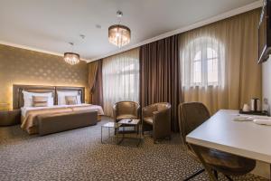 Rúm í herbergi á Hotel SEN