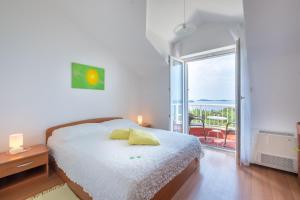 Ein Bett oder Betten in einem Zimmer der Unterkunft Villa Panorama Dubrovnik