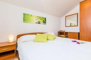Ein Bett oder Betten in einem Zimmer der Unterkunft Villa Panorama Dubrovnik