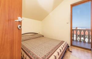 Postel nebo postele na pokoji v ubytování Apartman Ivan Kali