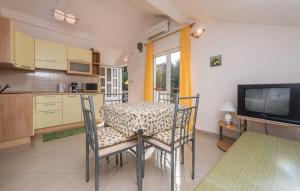 Kuchyň nebo kuchyňský kout v ubytování Apartman Ivan Kali + 3 fotografie