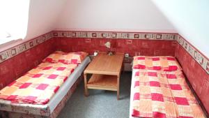 Postel nebo postele na pokoji v ubytování Vila Lenka