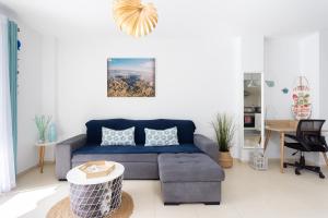 A seating area at Home2Book Stunning Apartment Bajamar
