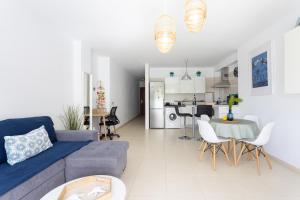 A kitchen or kitchenette at Home2Book Stunning Apartment Bajamar