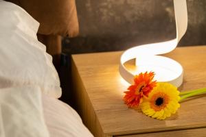 A bed or beds in a room at Eutuxia