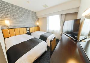 TV a/nebo společenská místnost v ubytování APA Hotel Aomori Eki Kenchodori + 37 fotografií