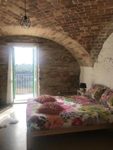Säng eller sängar i ett rum på Karaktervolle modern uitgeruste woning - Casa Di Martile