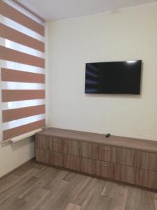 TV a/nebo společenská místnost v ubytování Prometey Hotel