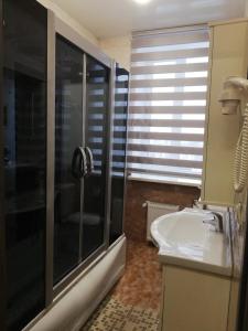 Koupelna v ubytování Prometey Hotel