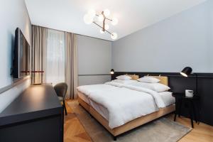 Postel nebo postele na pokoji v ubytování Alice Hotel