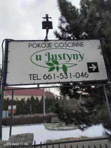 a sign for a poteote costuming u justify at U Justyny in Chróścice