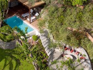 an overhead view of a swimming pool in a villa at Eagles Palace in Ouranoupoli