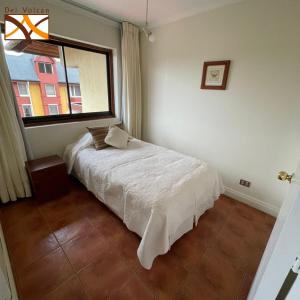 Postel nebo postele na pokoji v ubytování Hotel del Volcán