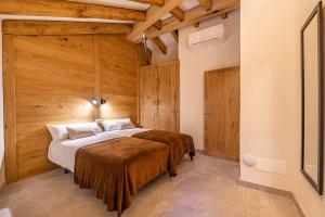 A bed or beds in a room at Casa Leon 84 by Sealand Villas