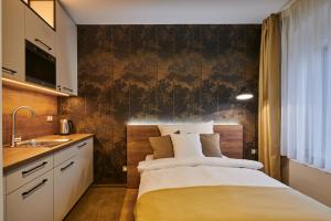 Hotel Alfréd a Hermína客房内的一张或多张床位