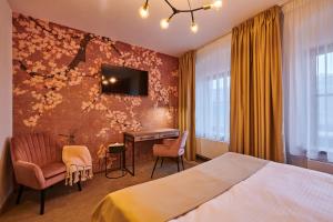 Hotel Alfréd a Hermína客房内的一张或多张床位
