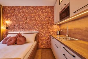 Hotel Alfréd a Hermína客房内的一张或多张床位