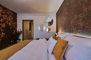 Hotel Alfréd a Hermína客房内的一张或多张床位