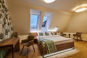 Hotel Alfréd a Hermína客房内的一张或多张床位
