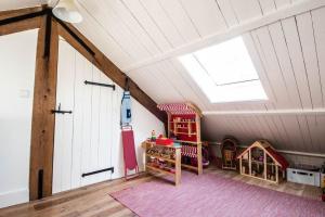 Postel nebo postele na pokoji v ubytování Farmhouse 'het Plakje'