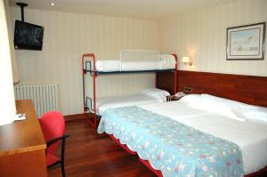 Postel nebo postele na pokoji v ubytování Snö Hotel Candanchú