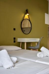Postel nebo postele na pokoji v ubytování Iraklis Apartments