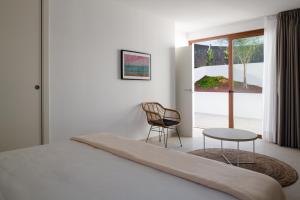 Postel nebo postele na pokoji v ubytování Villas Altos de Lanzarote