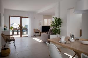 TV a/nebo společenská místnost v ubytování Villas Altos de Lanzarote