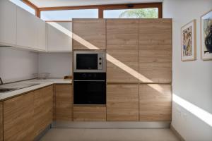 Kuchyň nebo kuchyňský kout v ubytování Villas Altos de Lanzarote