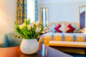 Cama ou camas em um quarto em Hotel Polonia Palace